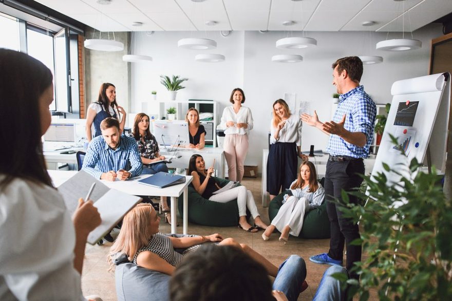 Executives in a working meeting using the DOIT methodology