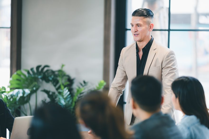 Leader mentoring an executive team